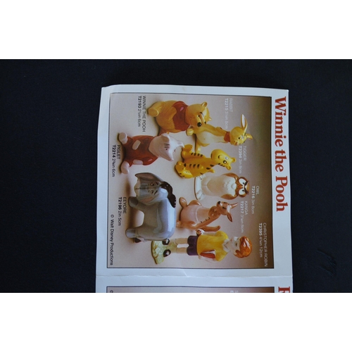 235 - John Beswick group of nine Winnie the Pooh figures to comprise: Christopher Robin, Winnie the Pooh, ... 
