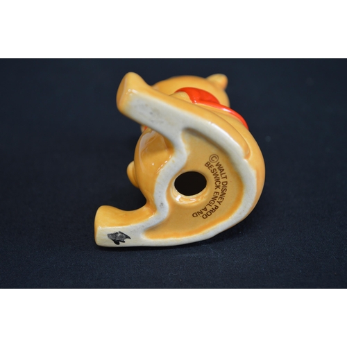 235 - John Beswick group of nine Winnie the Pooh figures to comprise: Christopher Robin, Winnie the Pooh, ... 