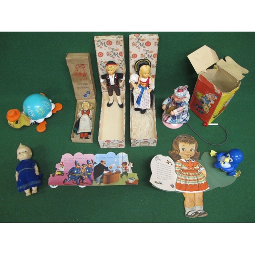 158 - Three boxed Foreign dolls, small Rosebud doll, pull-a-long Fisher-Price tortoise, boxed clown with c... 