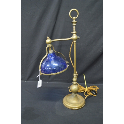 163 - Two brass adjustable table lamps with glass lamp shades