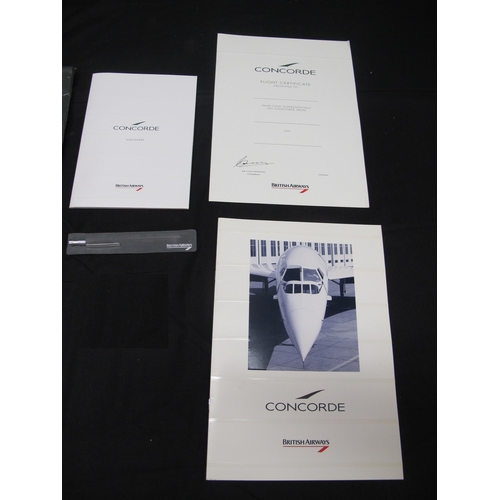 172 - Two 1990's British Airways Concorde flight folders, one containing a stationery pack, pen, flight ce... 