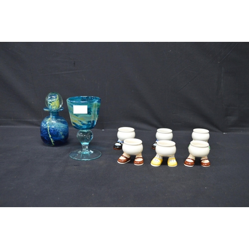 180 - Mdina glass scent bottle together with a Mdina glass goblet and a set of six Carltonware walking egg... 