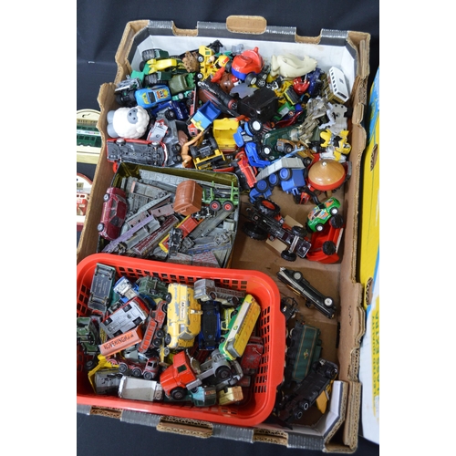 26 - Two boxes containing playworn toy vehicles and toy soldiers etc