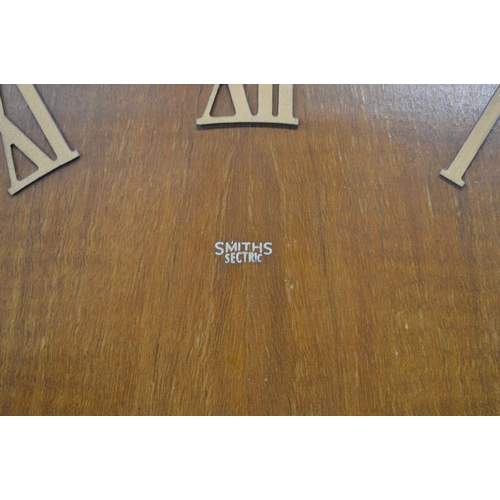 27 - Two clocks to comprise: a Smiths Sectric electric wall clock with Roman Numerals and a battery opera... 