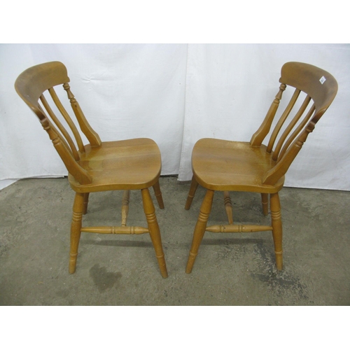 276 - Pair of beech country kitchen chairs having slat backs, standing on turned legs with stretchers - 47... 