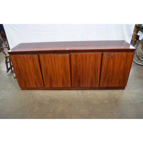 284 - Skovby Danish rosewood sideboard having four doors, one door opening to five baize lined slides, two... 