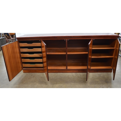 284 - Skovby Danish rosewood sideboard having four doors, one door opening to five baize lined slides, two... 