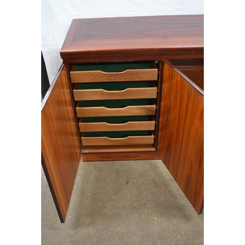 284 - Skovby Danish rosewood sideboard having four doors, one door opening to five baize lined slides, two... 