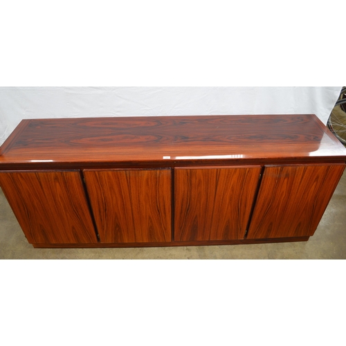 284 - Skovby Danish rosewood sideboard having four doors, one door opening to five baize lined slides, two... 