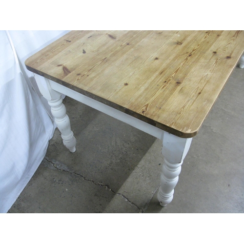 292 - Pine country kitchen dining table having a six plank top over a single drawer, standing on turned le... 