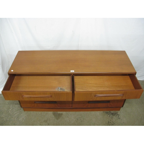 297 - G-Plan Fresco teak chest of eight graduated drawers with recessed handles, standing on a plinth base... 