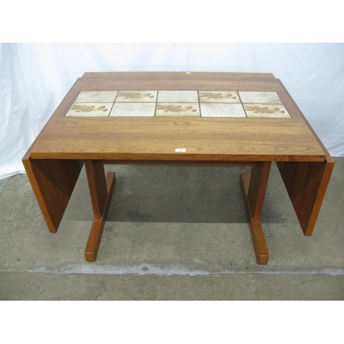 306 - Possibly Gangso Mobler teak and inset tile top extending dining table having floral tiles and two re... 