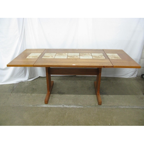 306 - Possibly Gangso Mobler teak and inset tile top extending dining table having floral tiles and two re... 