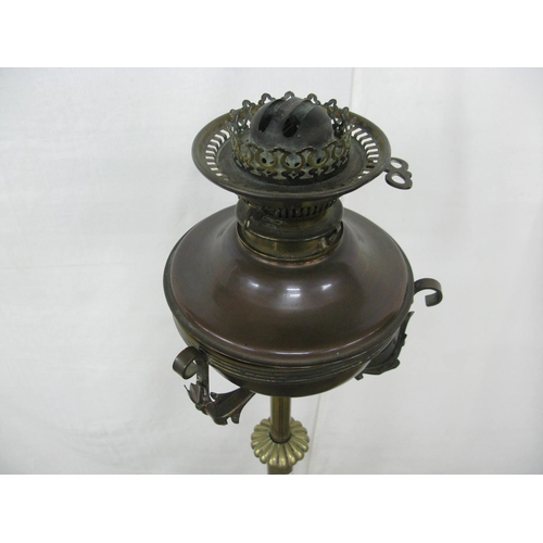 307 - Brass telescopic oil lamp standard, standing on a scrolled tripod base - 49cm x 49cm x 144cm tall