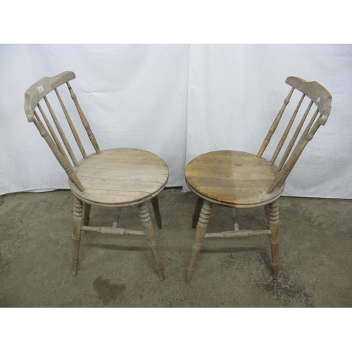 311 - Pair of beech stick back chairs having round seats, standing on turned legs with stretchers - 42cm x... 