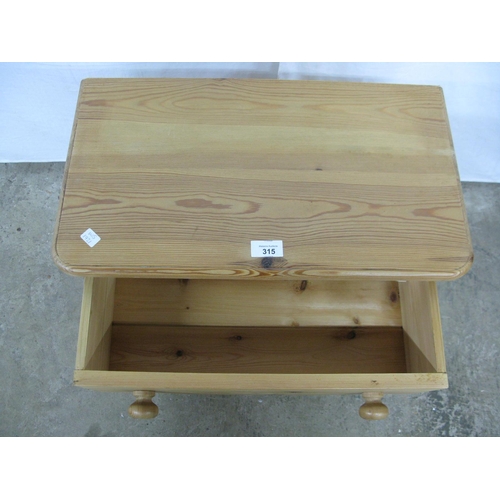 315 - Small pine chest of three drawers, standing on a shaped plinth base - 53cm x 29.5cm x 61cm tall