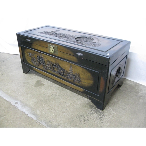 316 - Yuen Lee Carved Furniture Works Oriental carved camphorwood blanket box, the hinged lift lid having ... 