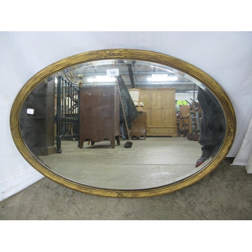 320 - Oval gilt frame bevelled edge mirror - 81cm x 57cm together with a modern painted side table, the ga... 