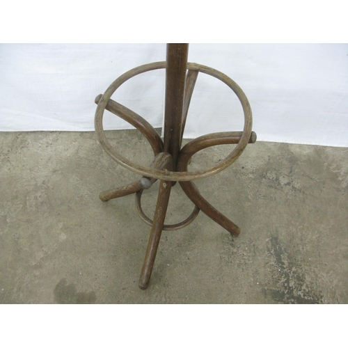 324 - Bentwood hat stand having six scrolled hooks over an umbrella stand, standing on splayed supports - ... 