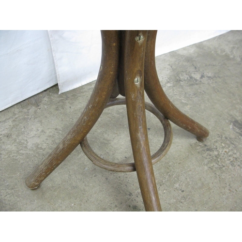 324 - Bentwood hat stand having six scrolled hooks over an umbrella stand, standing on splayed supports - ... 