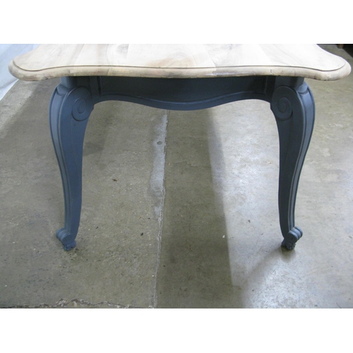 331 - French dining table, the shaped top over three drawers, standing on carved angled cabriole legs - 17... 