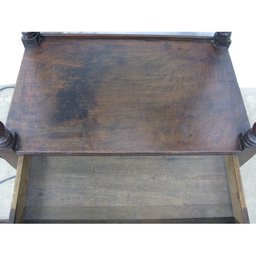 332 - Mahogany washstand/side table, the loose top with wash basin aperture below, standing on turned supp... 