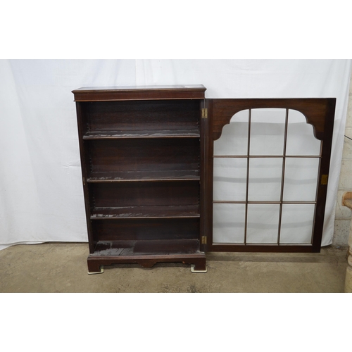 336 - Glazed mahogany display cabinet, the astragal glazed door opening to three adjustable shelves, stand... 