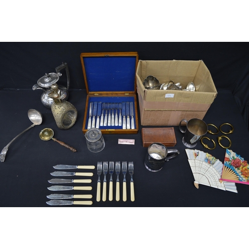 34 - Two boxes of silver-plate to include: cutlery, teapot, tankards etc