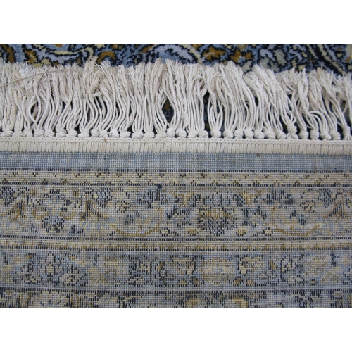 352 - Super Keshan blue ground patterned rug having a central lozenge with intricate floral and foliate de... 