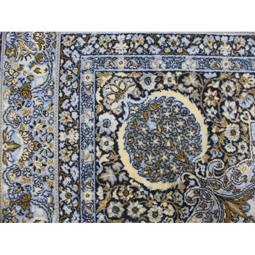 352 - Super Keshan blue ground patterned rug having a central lozenge with intricate floral and foliate de... 