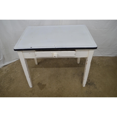 353 - Enamel top kitchen table having a single drawer and standing on square tapering legs - 92cm x 64cm x... 