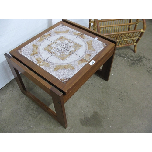 354 - Mid century teak tile top coffee table, the tile top standing on a quad form base - 55cm x 48cm x 40... 