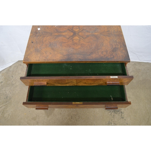 355 - Harrods walnut cutlery canteen on stand having two drawers both opening to a green baized lining wit... 