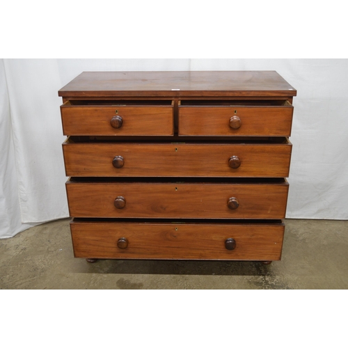 356 - Mahogany chest of two short over three long graduated drawers, standing on turned legs - 115cm x 53c... 