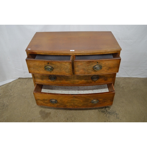 372 - Bow fronted mahogany chest of two short over two long drawers, standing on splayed front legs - 92cm... 