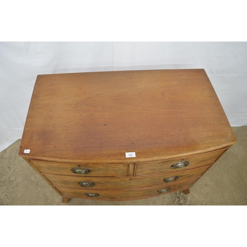 372 - Bow fronted mahogany chest of two short over two long drawers, standing on splayed front legs - 92cm... 