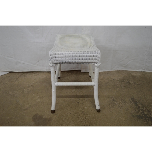 377 - Lloyd Loom chair standing on round legs with metal end caps - 54cm x 52cm x 72cm tall together with ... 