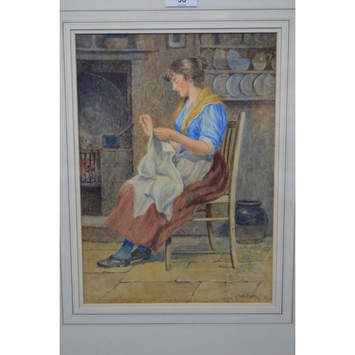 38 - J Ford Jones, watercolour of lady seated sewing in a kitchen setting - 25cm x 35cm, mounted in glaze... 