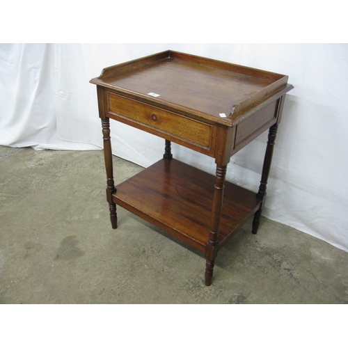 380 - Mahogany side table having 3/4 gallery top over a single drawer with a lower tier united by turned s... 