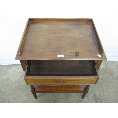 380 - Mahogany side table having 3/4 gallery top over a single drawer with a lower tier united by turned s... 