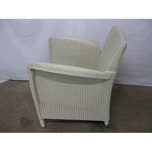 383 - Vincent Sheppard Lloyd Loom style armchair, standing on round legs with chrome end caps - 70cm x 64c... 