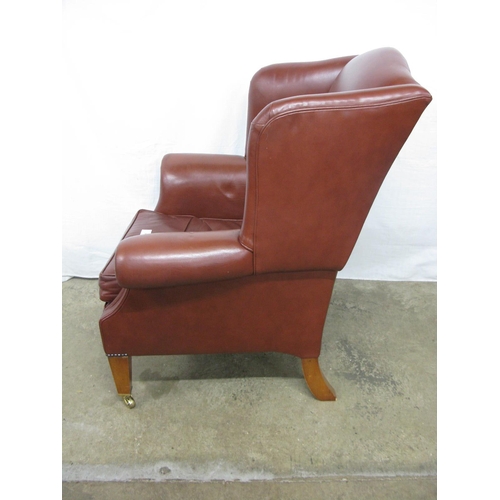 390 - Duresta modern wing back leather armchair, standing on square tapered front legs with castors - 94cm... 