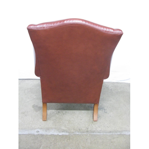 390 - Duresta modern wing back leather armchair, standing on square tapered front legs with castors - 94cm... 