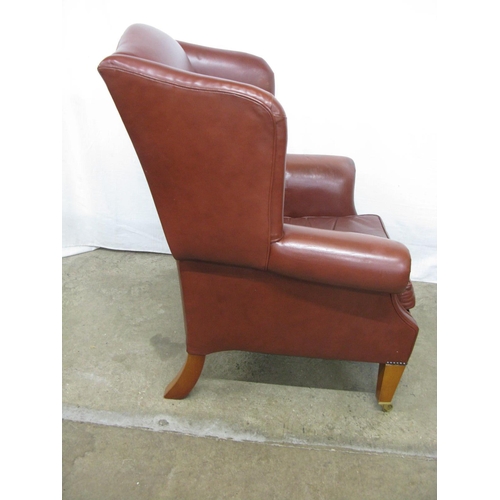 390 - Duresta modern wing back leather armchair, standing on square tapered front legs with castors - 94cm... 