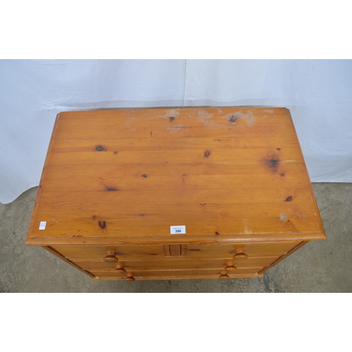 396 - Modern pine chest of two short over two long drawers, standing on turned legs - 79.5cm x 45cm x 72cm... 