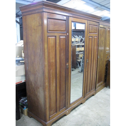 401 - Mahogany compactum wardrobe having two doors opening to four linen slides over two short drawers and... 