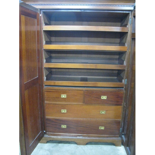 401 - Mahogany compactum wardrobe having two doors opening to four linen slides over two short drawers and... 