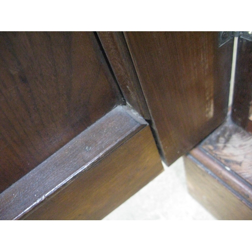 401 - Mahogany compactum wardrobe having two doors opening to four linen slides over two short drawers and... 