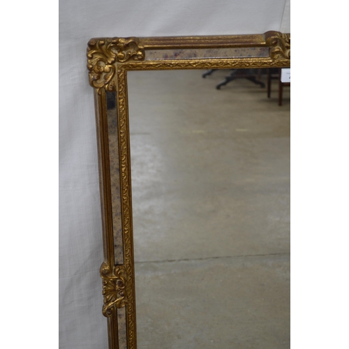 407 - Ornate rectangular gilt framed mirror - 67cm x 94cm tall