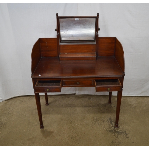 409 - Mahogany dressing table having a central mirror with trinket box below a raised gallery back, one fa... 